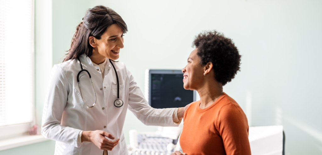 Picture of a doctor speaking to a Black African American woman